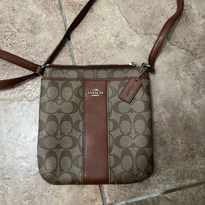 Coach tan and brown purse.